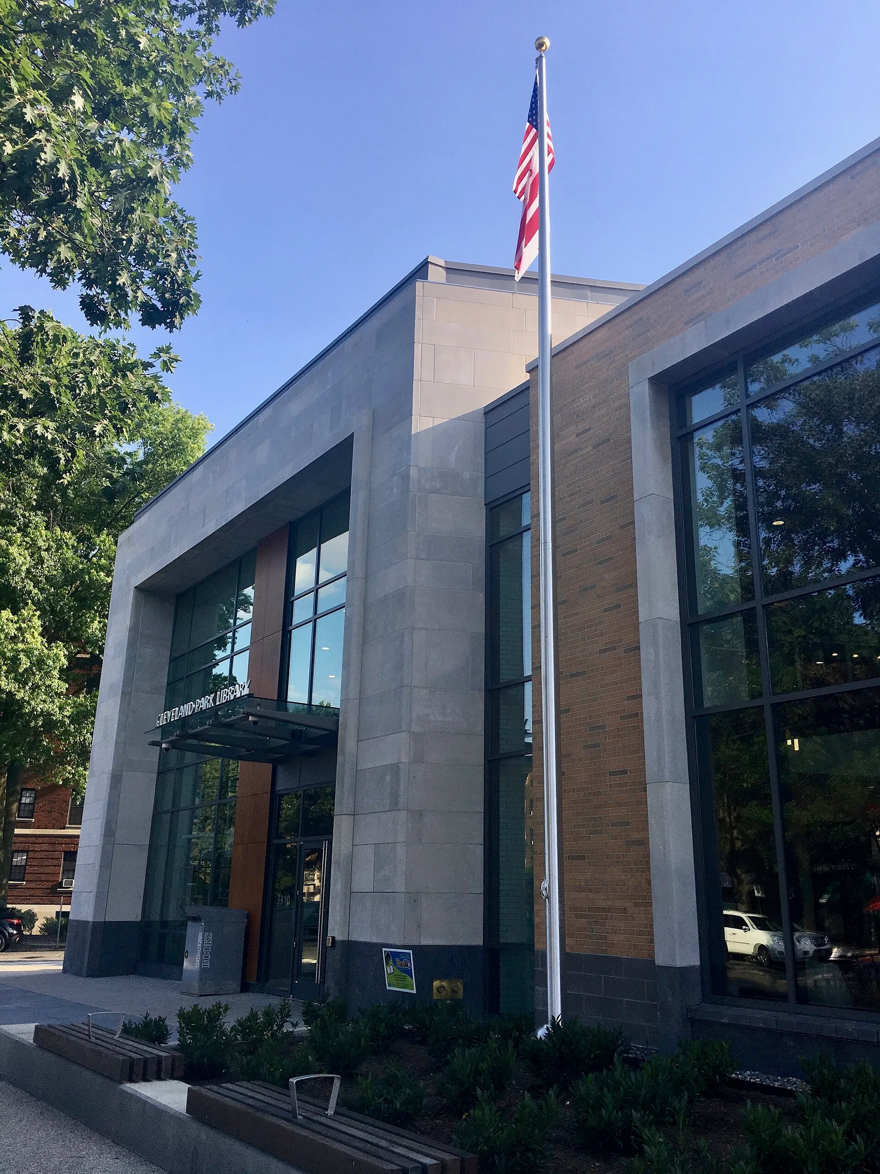 The modern stone and glass facade of Cleveland Park Library in Washington, DC
